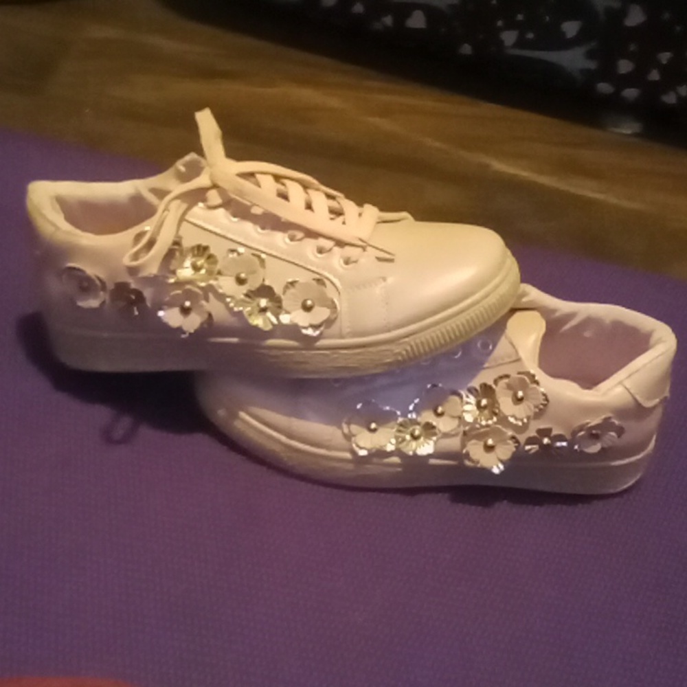 These are Shoes I bought for my daughter but she never ended up wearing them.